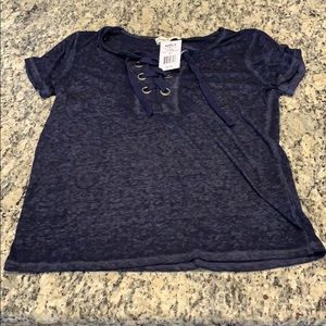 Dark blue ties at the neck